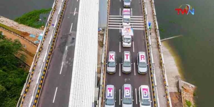 Arvind Alishetty greeted Minister KTR in a grand and innovative way by saying Happy Birthday KTR on top of the cars on the cable bridge.Vedham Foundation,Telugu Golden TV,Telugu,www.teluguworldnow.com