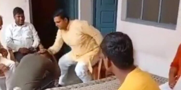 దళిత యువకుడిపై దాడి.. పరారీలో గ్రామ సర్పంచ్.